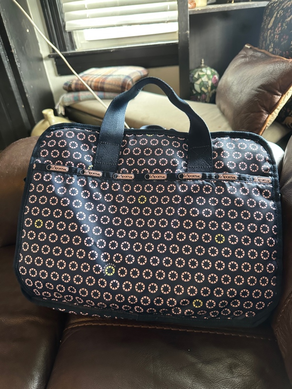 LeSportsac Navy Bag with Pink Dot Floral Pattern